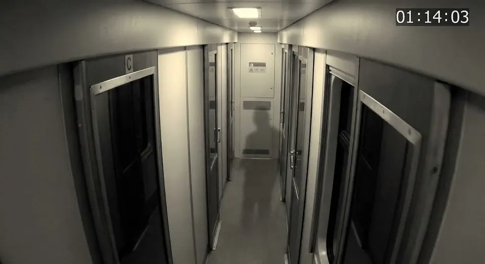 Sleeper corridor camera still at 01:14:03